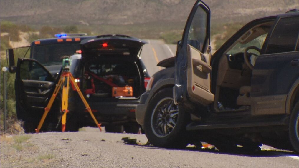Crash Recon Unit image 1 Post-accident scene showing car with damage and equipment on site